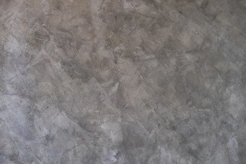 it is cement wall and floor with shadow for pattern and background.