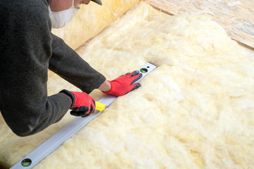 Work composed of mineral wool insulation in the floor, floor heating insulation , warm house,...
