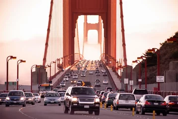 Foto op Canvas San Francisco Golden Gate bridge traffic on foggy day dramatic evening light © PixHound