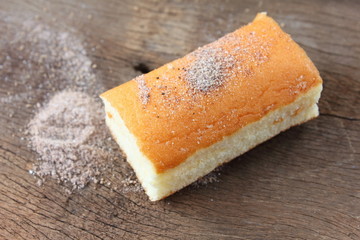fresh sweet homemade delicious cake on wooden background