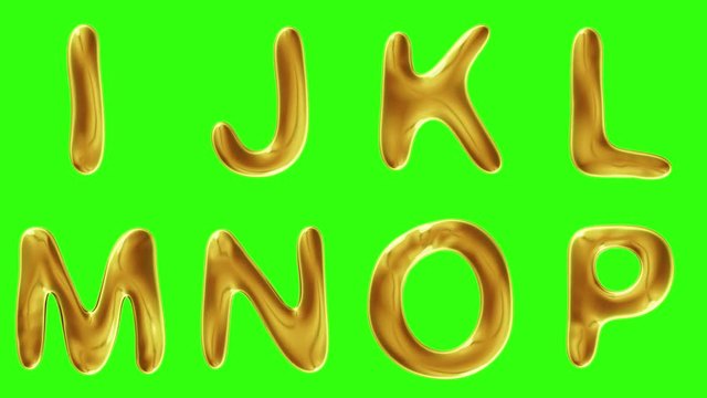 Alphabet from gold isolated on green background.