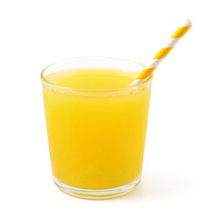 Yellow soft drink in glass. Isolated on white background