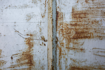 White tin background with rust scratches. Old vintage texture.