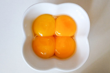 Four eggs on a bowl