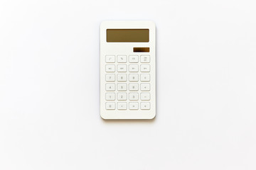 White powered solar calculator isolated on white background viewed from above in studio.