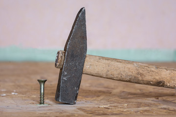 Construction tools, hammer and nail