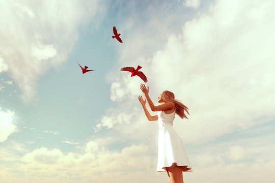 Live your freedom,girl releasing birds on to the sky,3d illustration