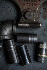 Plumbing Pipe on a Steel Background 