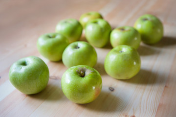 Fototapeta na wymiar Many green large apples