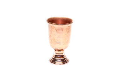 Copper cup on white background