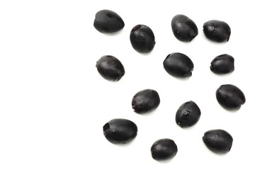 Marinated black olives isolated on white background. top view