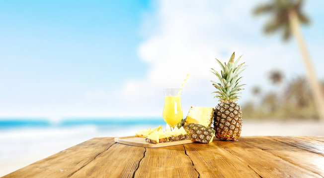 Summer photo of pineapple and free space 