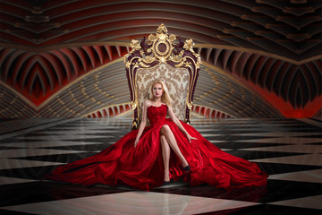 Blonde woman sitting on the throne - obrazy, fototapety, plakaty