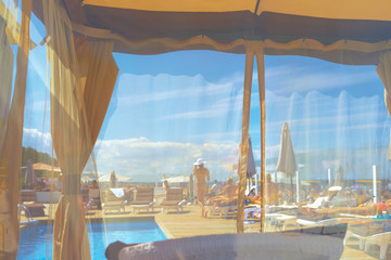 Beach with pool on a summer day