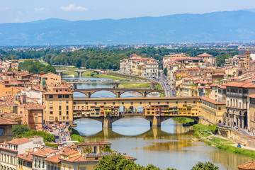 Fototapeta na wymiar View of Florence from Piazzale Michelangelo - River Arno with Ponte Vecchio and Palazzo Vecchio - Tuscany, Italy
