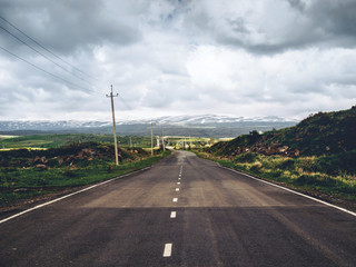 Fototapeta premium scenic shot of empty road with mountains on background, Armenia