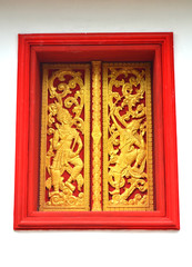 Golden Carvings Statues and Murals  within the Buddhist Temples of Luang Prabang Laos