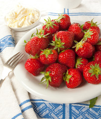 Cream and strawberries