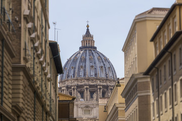 Fototapeta na wymiar View of St Peter's basilica dome in Rome, Italy