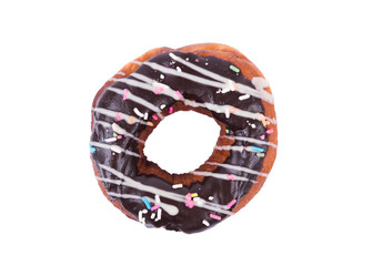 Chocolate donut with sprinkles on white background.