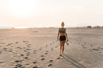 Woman Runner Walking on Beach