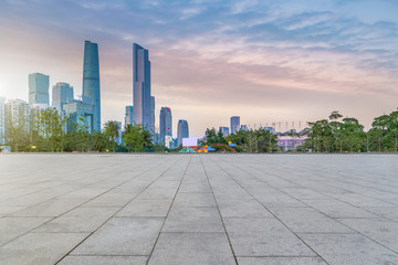 Urban skyscrapers with empty square floor tiles