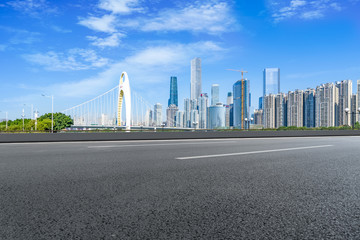 Obraz premium Prospects for expressway, asphalt pavement, city building commercial building, office building