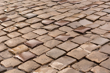 Wet stone road. Texture.