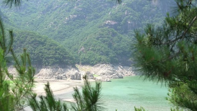 Mountain and lake side in the sunny day