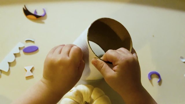 Video Of A Young Toddler Boy Making Spooky Halloween Crafts With His Mom At Their Living Room Table