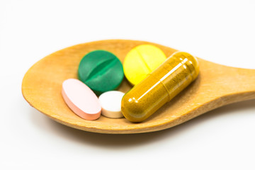 Medicine is in a wooden spoon