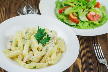 Italian pasta with chicken and cream sauce