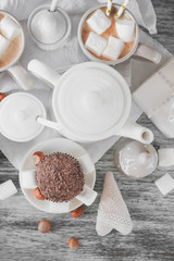 Teapot, cupcakes and different decorations