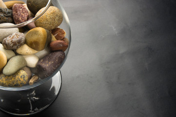decorative pebbles in glass containers