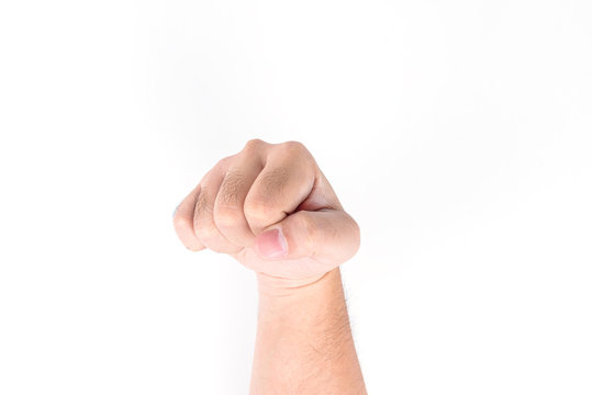 Male fist for knocking the door or uppercut rival isolated on white background.
