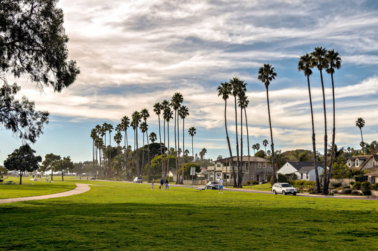 People enjoy a walk along Shoreline park in Santa Barbara, California.