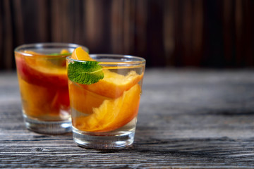 delicious and cold peach cocktail