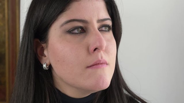 Sad depressed attractive young woman crying,thinking her died father