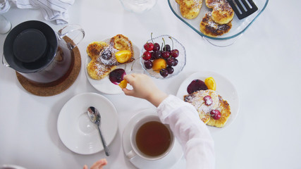 Morning breakfast - tea with homemade sweets and fruits