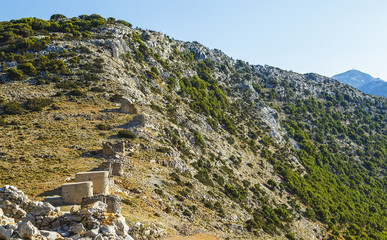 Ruins of encient windmills built in 15th century. Lassithi Plateau, Crete, Greece. Most typical characteristic of the Plateau.In the past they numbered thousands making up magnificent landscape.