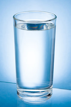 Glass of Water isolated on a blue background