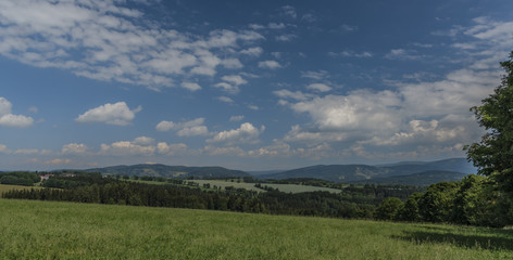 Obraz premium Krkonose mountains in blue sky cloudy day