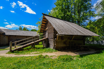 Ancient wooden log horse barn.