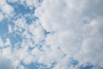Blue sky background with  white clouds