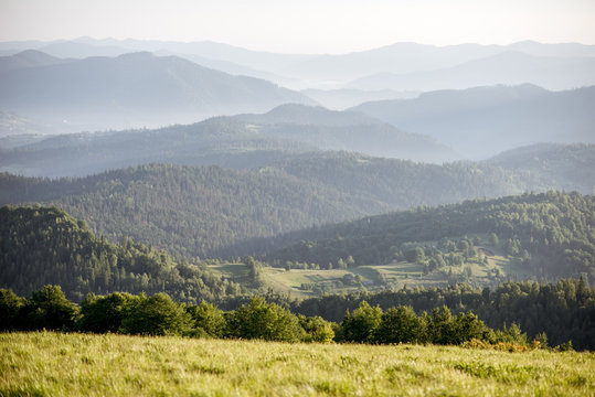 Landscape view on the beautiful Carpathian mountains from the High Top near the Slavske village during the sunrise in Ukraine