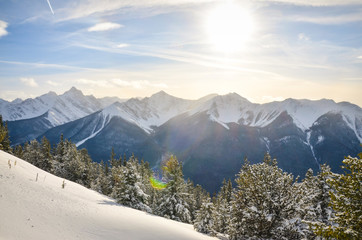 Winter Landscape of Sun Flare and Mountains in Canada