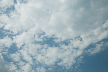 Blue sky background with  white clouds