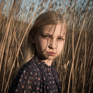 Portrait of girl in field
