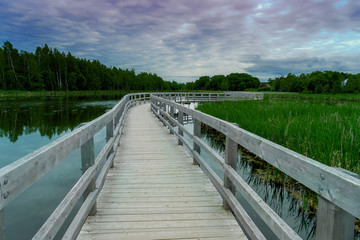 Boardwalk over the lake and marsh at the Sackville Waterfowl Park in Sackville, New Brunswick, Canada.