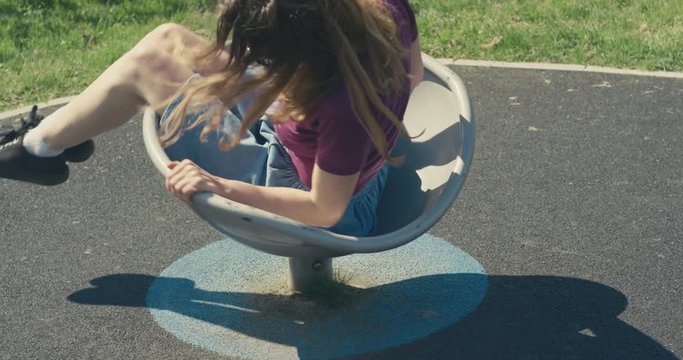 Young woman at the playground
